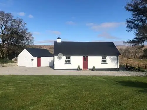 cottage-red-door-trees-grass-ireland-donegal-traditional cottage-contact us